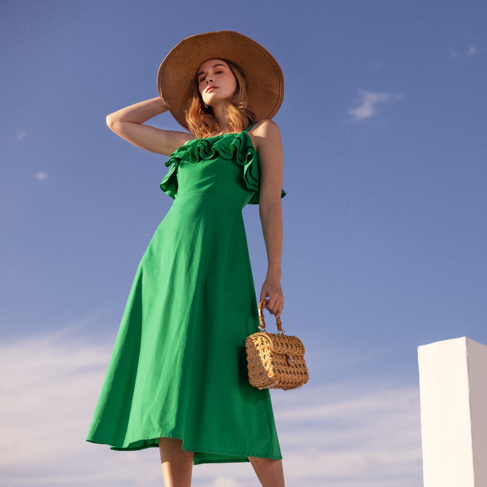 woman in debenhams clothing in front of blue sky