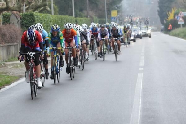 The leading bunch was strung out on the fast run in to Cittiglio