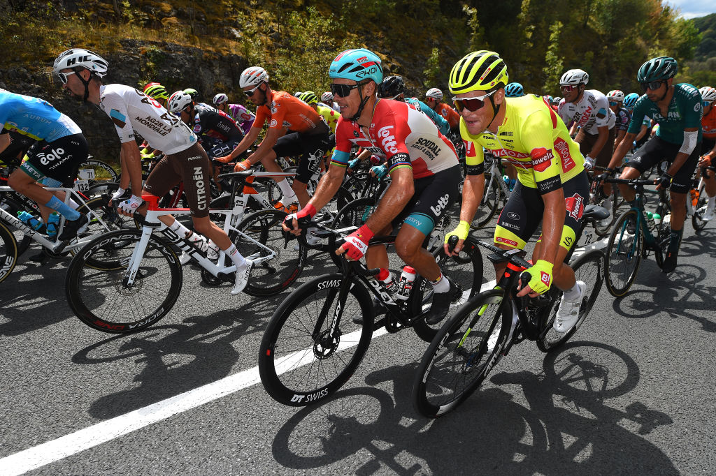 LIMOGES FRANCE AUGUST 18 LR Philippe Gilbert of Belgium and Team Lotto Soudal and Dimitri Peyskens of Belgium and Team Bingoal Pauwels Sauces Wb compete during the 55th Tour du Limousin Nouvelle Aquitaine 2022 Stage 3 a 1817km stage from Donzenac to Malemort TDL2022 on August 18 2022 in Limoges France Photo by Dario BelingheriGetty Images