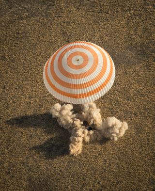 Soyuz Spacecraft Lands with Expedition 36 Crew