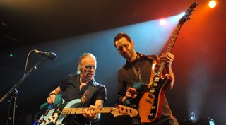 Billy Sheehan (left) and Paul Gilbert perform onstage with Mr. Big at KOKO on October 17, 2014 in London