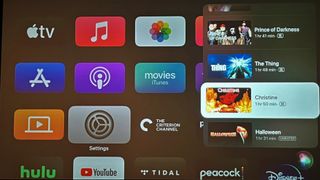 Apple TV interface showing Siri search results