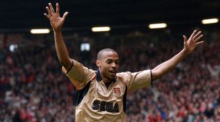 MANCHESTER, UNITED KINGDOM: Arsenal's Thierry Henry celebrates after his team beat Middlesborough 1-0 in their FA Cup semi-final at Old Trafford in Manchester 14 April 2002. AFP PHOTO BY PAUL BARKER (Photo credit should read PAUL BARKER/AFP via Getty Images)