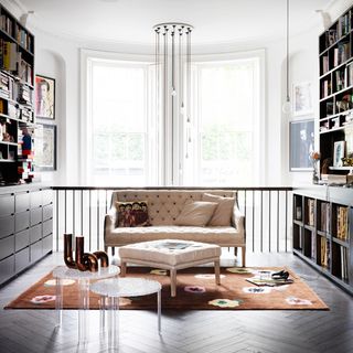 living room with book shelf and sofa