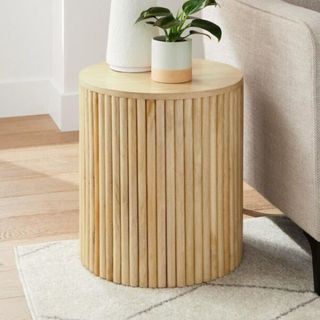 A wooden fluted coffee table from Home Depot