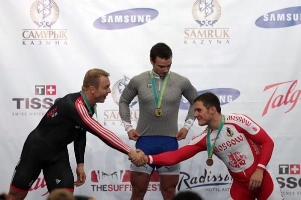 Keirin silver medalist Chris Hoy (Sky Track Cycling) congratulates bronze medalist Sergey Borisov (Moscow Track Team)