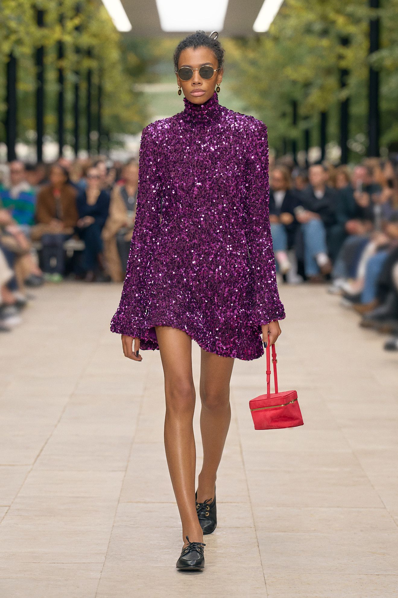 Model wears a purple sparkly dress on the Celine spring/summer 2026 runway.