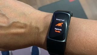 Fitbit Charge 5 showing cardio zone on screen
