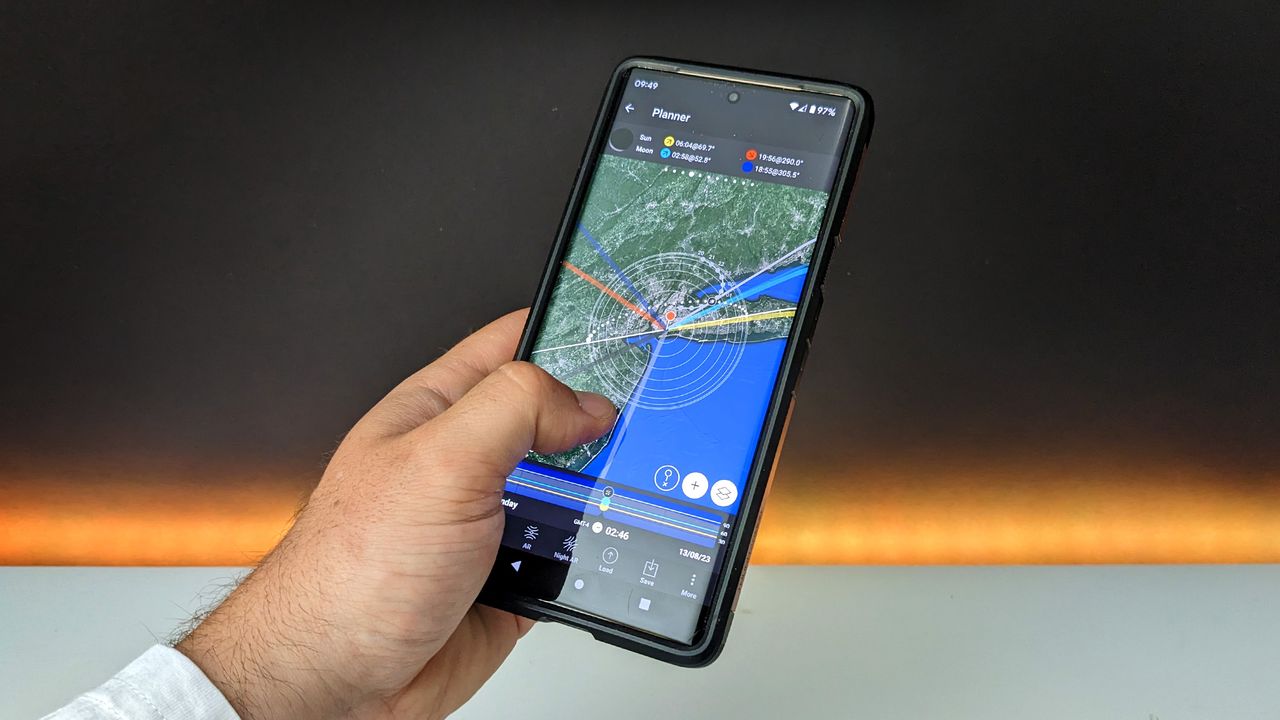 PhotoPills open on a phone with a planner pin on New York City