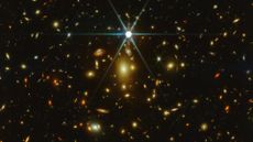 a deep field image showing many stars and galaxies