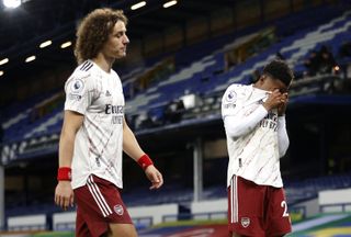 David Luiz and Joe Willock leave the pitch at Everton - where Arsenal lost for the fifth time in their last seven Premier League games.