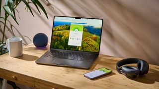 ExpressVPN apps running on a laptop and mobile during TechRadar&#039;s testing