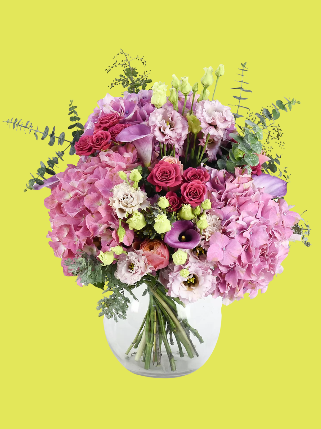 A vase of bright fresh flowers and eucalyptus from Mosyses Stevems