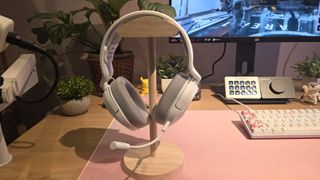 white corsair gaming headset on stand 