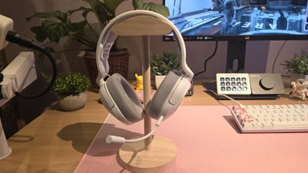 white corsair gaming headset on stand 