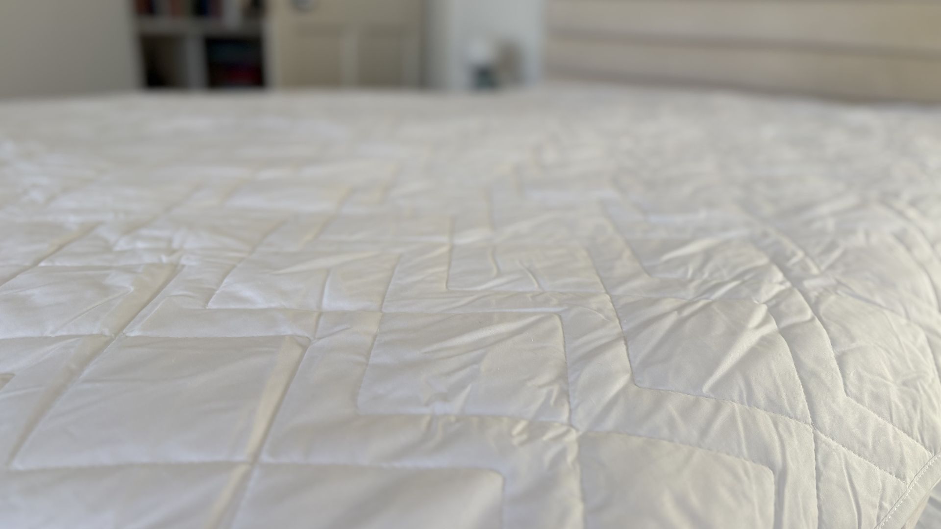 Simba Performance Mattress Protector being tested, on the bed