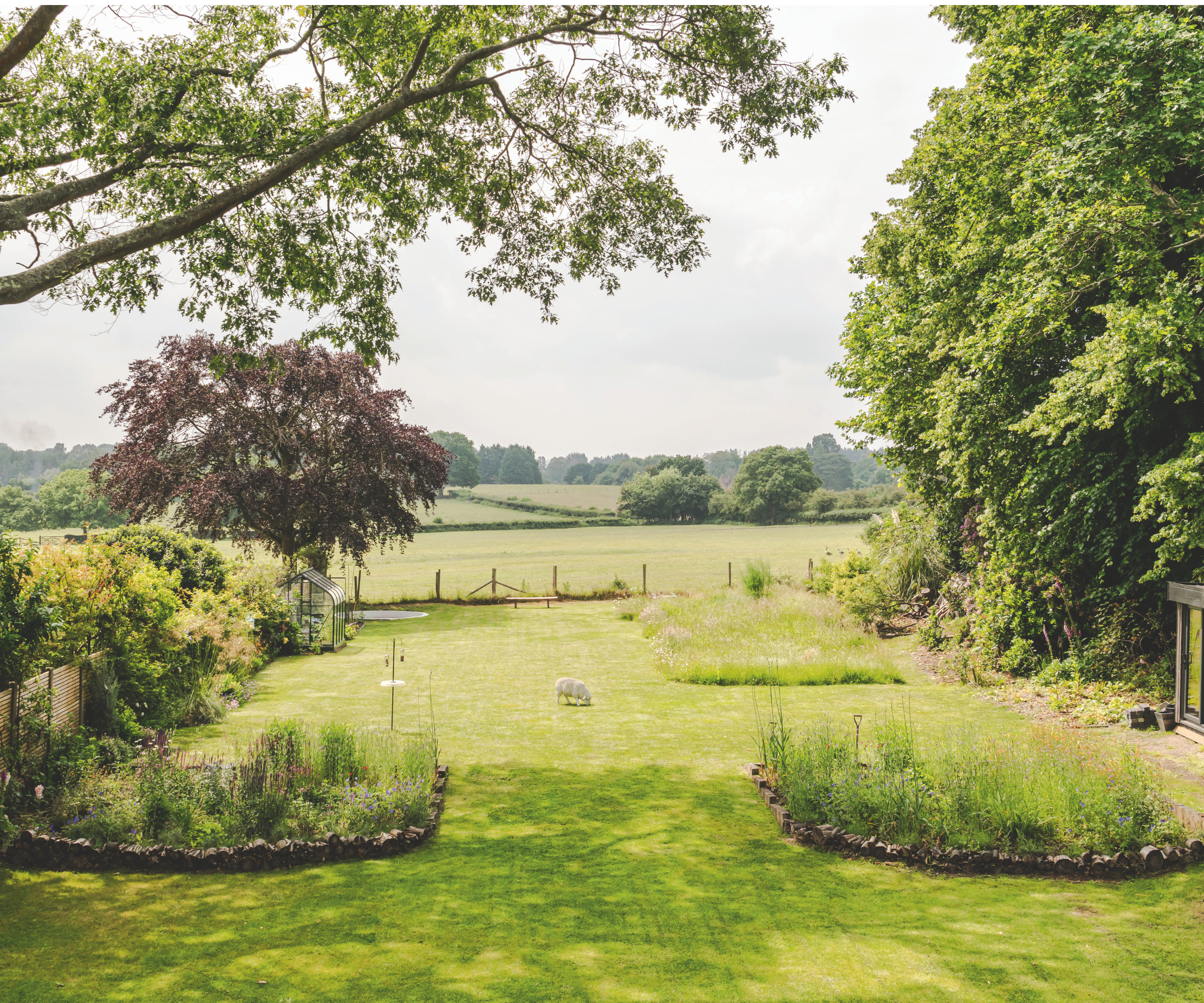 View from the garden - a lawn overlooking fields