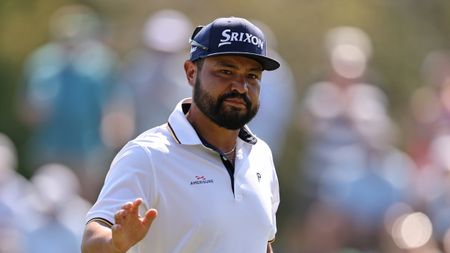 JJ Spaun waves to the crowd during the third round of the 2025 Players Championship