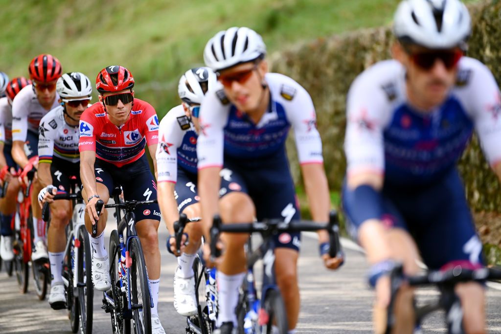 CISTIERNA SPAIN AUGUST 26 Remco Evenepoel of Belgium and Team QuickStep Alpha Vinyl Red Leader Jersey competes during the 77th Tour of Spain 2022 Stage 7 a 190km stage from Camargo to Cistierna LaVuelta22 WorldTour on August 26 2022 in Cistierna Spain Photo by Tim de WaeleGetty Images