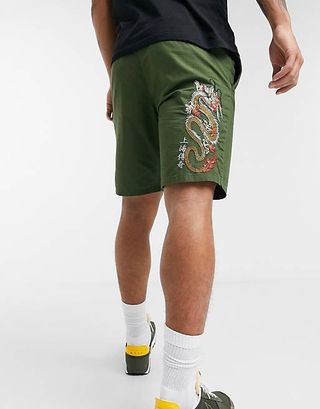 ASOS DESIGN slim cargo shorts with dragon embroidery