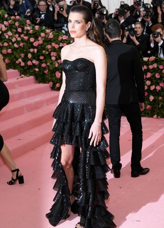 Charlotte Casiraghi pictured on the Met Gala steps wearing a sequin black gown