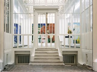 Entrance with glass enclosure at Gallery Derouillon Paris by Saba Ghorbanalinejad