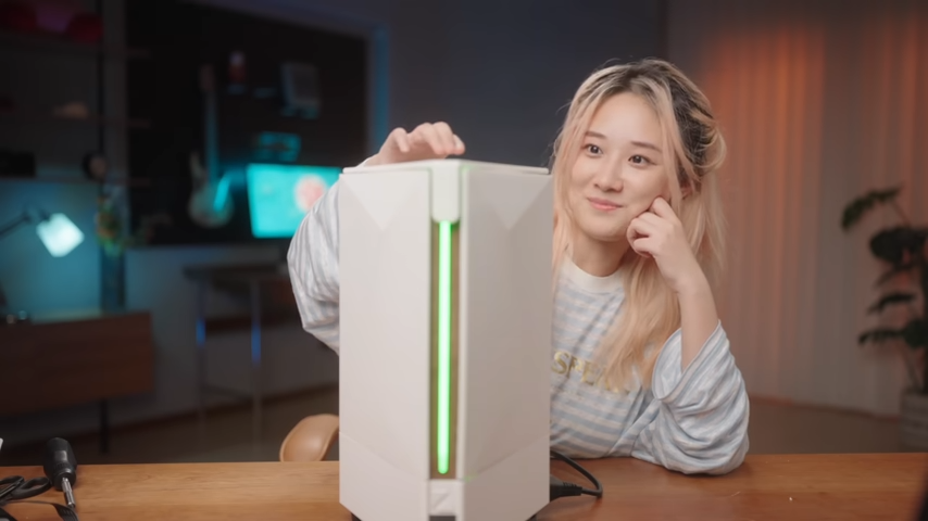 Tech creator 小宁子 XNZ with her 3-in-1 console creation, the 'Ningtendo PXBOX 5'