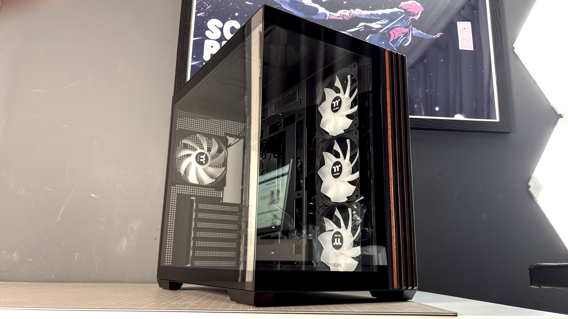 The Thermaltake View 380 WS ARGB on a desk with various components fitted.