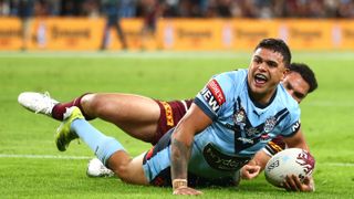 Latrell Mitchell of the NSW Blues smiles after scoring a try