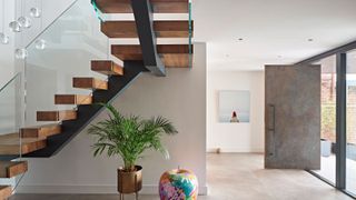 contemporary hallway with modern staircase