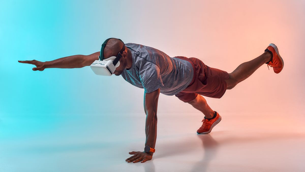 A VR user is working out while wearing a headset