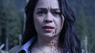 A bloodied Kaitlyn Santa Juana looks ahead with shock in Final Destination Bloodlines.