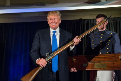 President Trump with a gun.