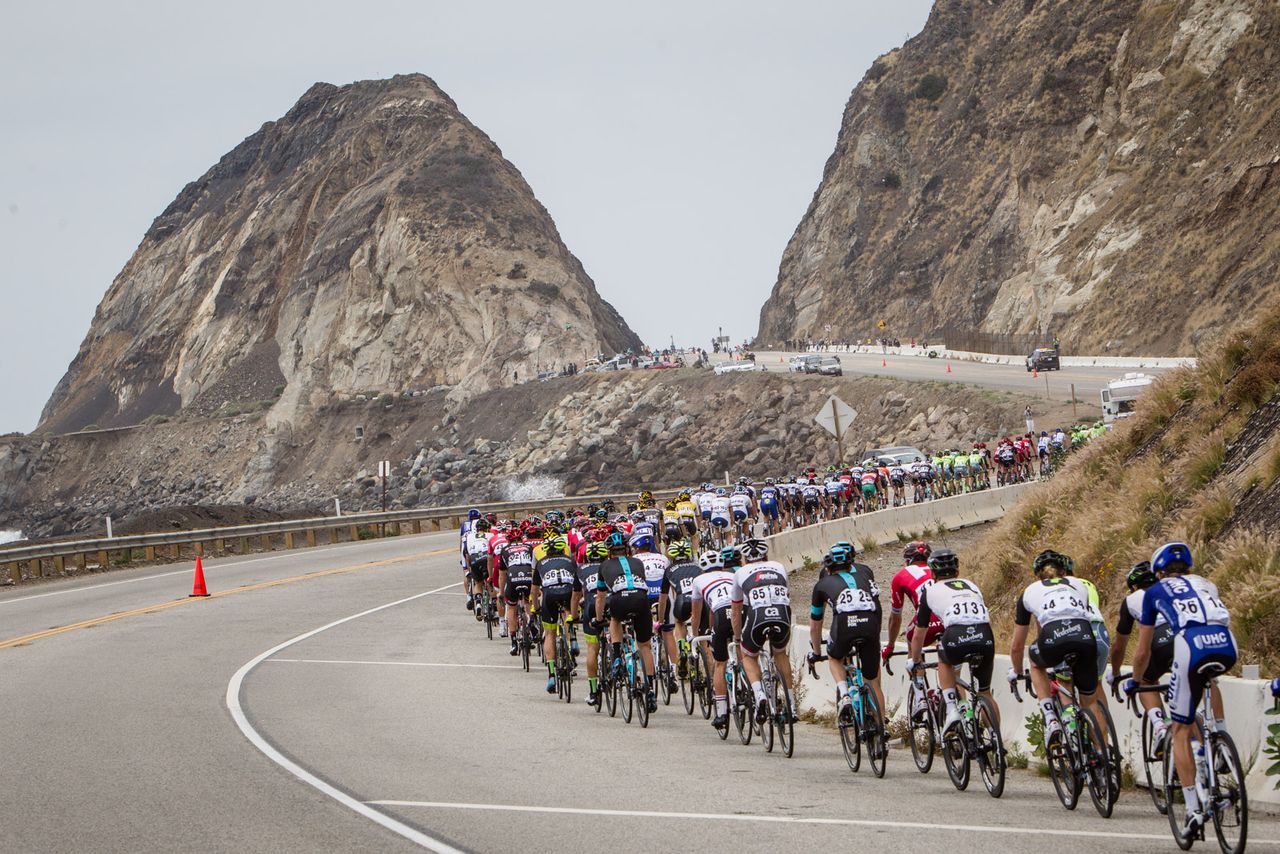 The peloton snakes its way up the road