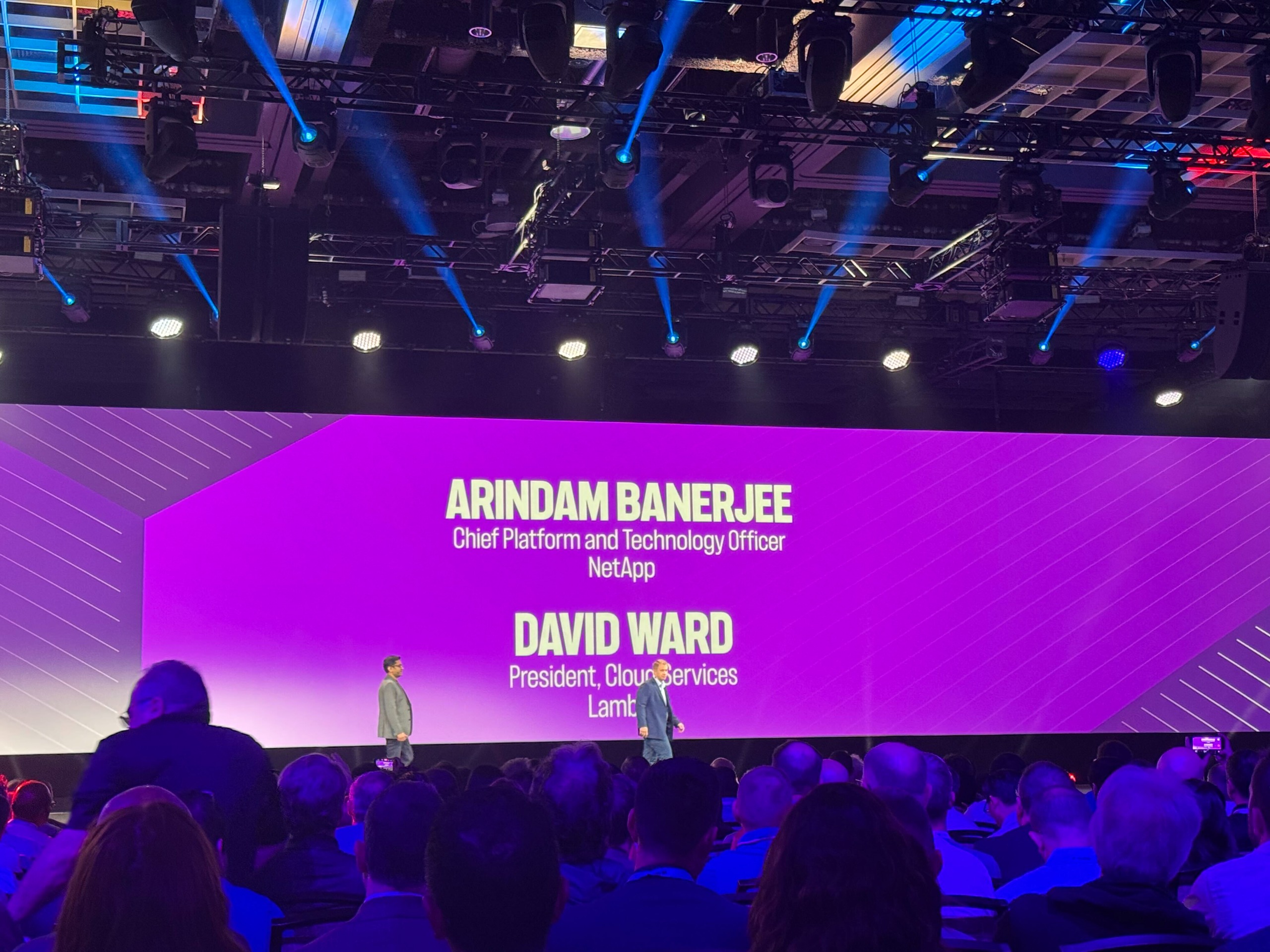 David Ward and Arindam Banerjee pictured on stages at NetApp Insight 2026.