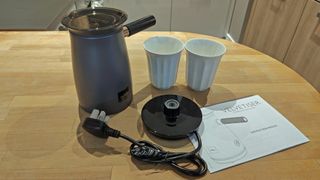 Hotel Chocolat Velvetiser review: kitchen table with contents of Velvetiser box