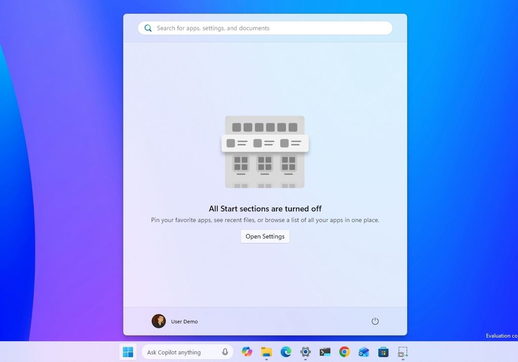 Windows 11 desktop with the new Start menu with section hidden.