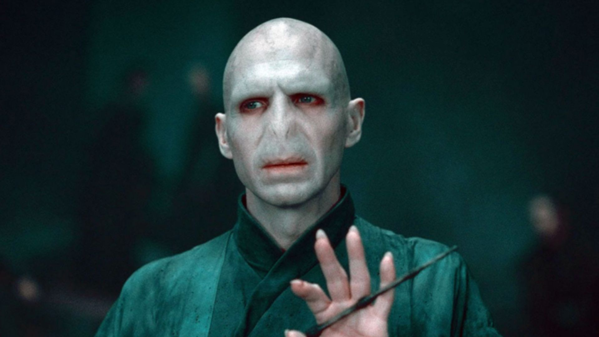 an image of Ralph Fiennes in character as voldemort in the original Harry Potter film