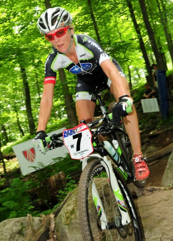 Heather Irmiger (Trek Subaru) descending over some boulders