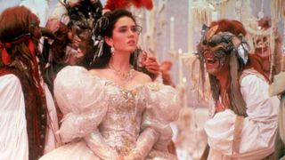 Jennifer Connelly in Labyrinth wearing a white dress during a ball.