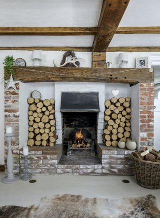 rustic fireplace with logs