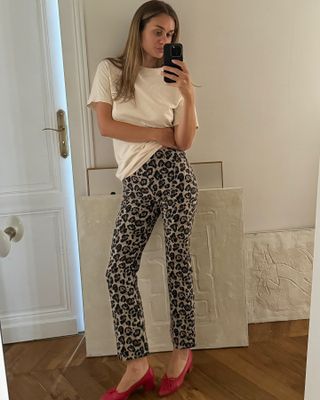 woman in leopard print pants