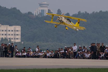 A model plane performs at North Korea's first air show