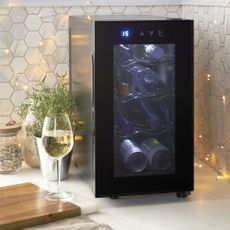 wine cooler in black colour with wine bottles