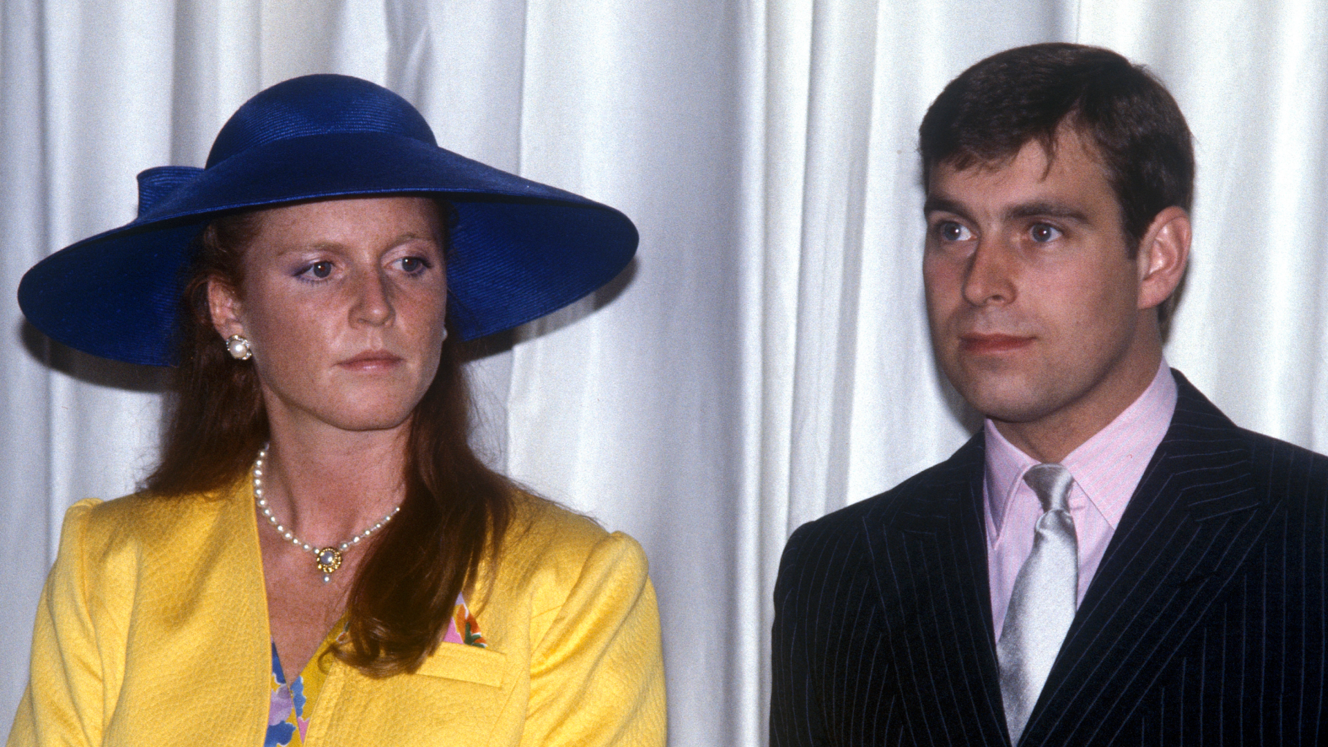 Sarah Ferguson and Prince Andrew looking sad