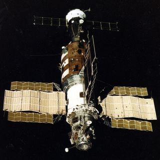 The Soviet-era Salyut 7 space station is seen in this photo by cosmonauts aboard the Soyuz T-13 mission in 1985.