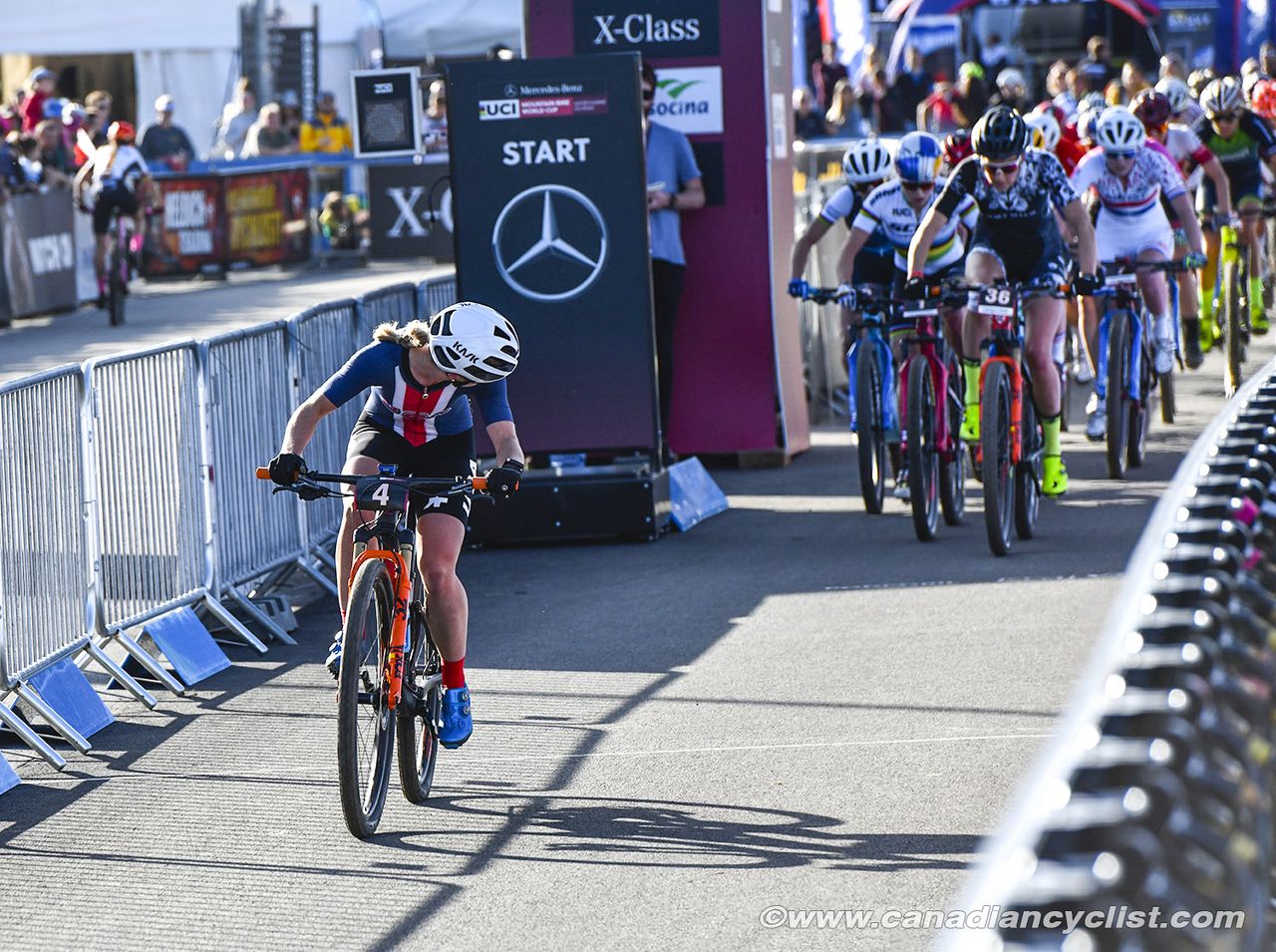 Chloe Woodruff (Team USA) checks to see who is chasing