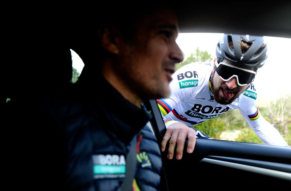 Peter Sagan chats at the team car during Bora-Hansgrohe camp