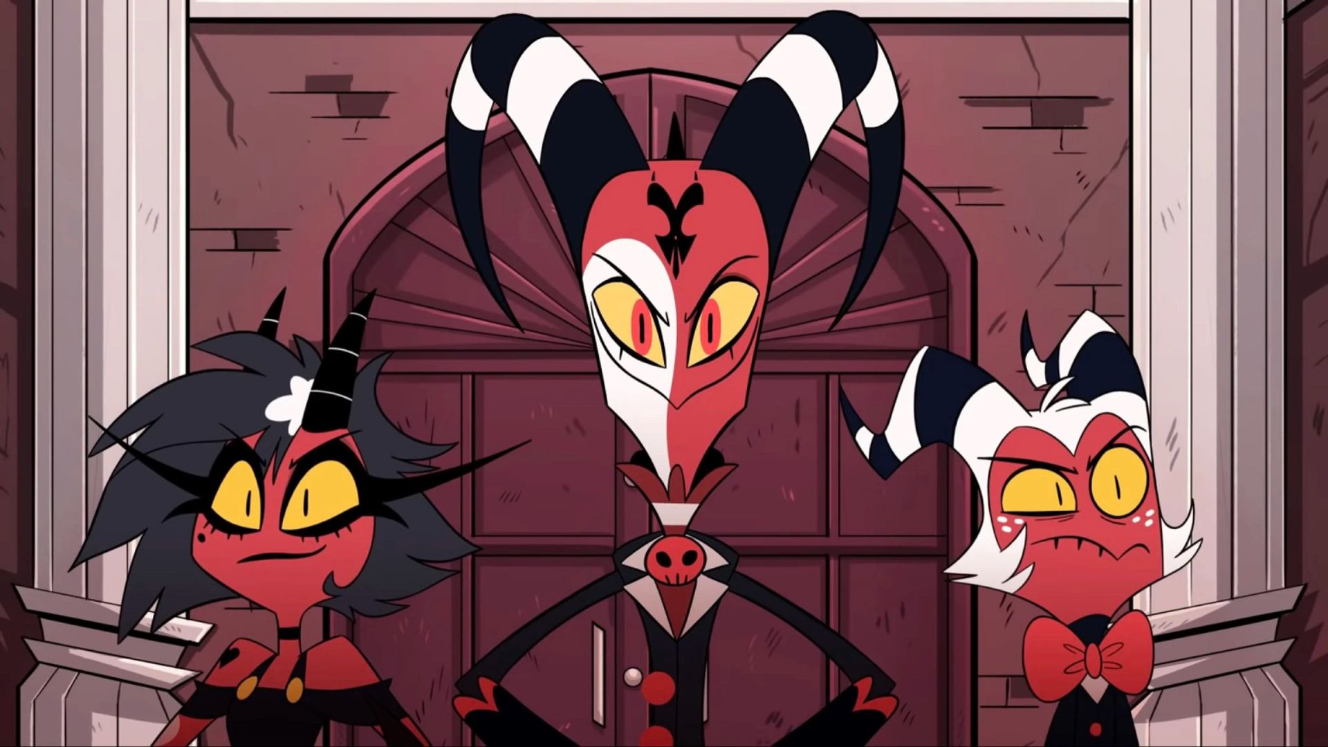 A devil imp stands in the middle towering over two smaller imps to each side