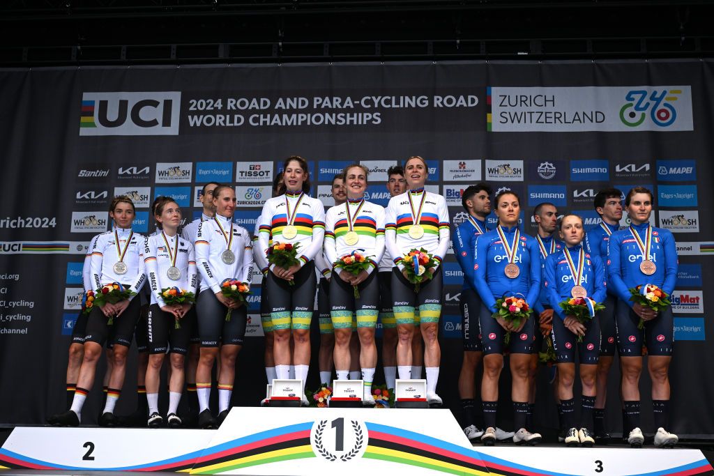 ZURICH SWITZERLAND SEPTEMBER 25 Gold medalists Michael Matthews Ben Oconnor Jay Vine Grace Brown Brodie Chapman Ruby RosemanGannon of Team Australia C Silver medalists Marco Brenner Miguel Heidemann Maximilian Schachmann Franziska Koch Liane Lippert Antonia Niedermaier of Team Germany L and Bronze medalists Edoardo Affini Mattia Cattaneo Filippo Ganna Elisa Longo Borghini Soraya Paladin Gaia Realini of Team Italy R pose on the podium during the 97th UCI Cycling World Championships Zurich 2024 Mixed Relay Team Time Trial a 537km one day race from Zurich to Zurich on September 25 2024 in Zurich Switzerland Photo by Dario BelingheriGetty Images